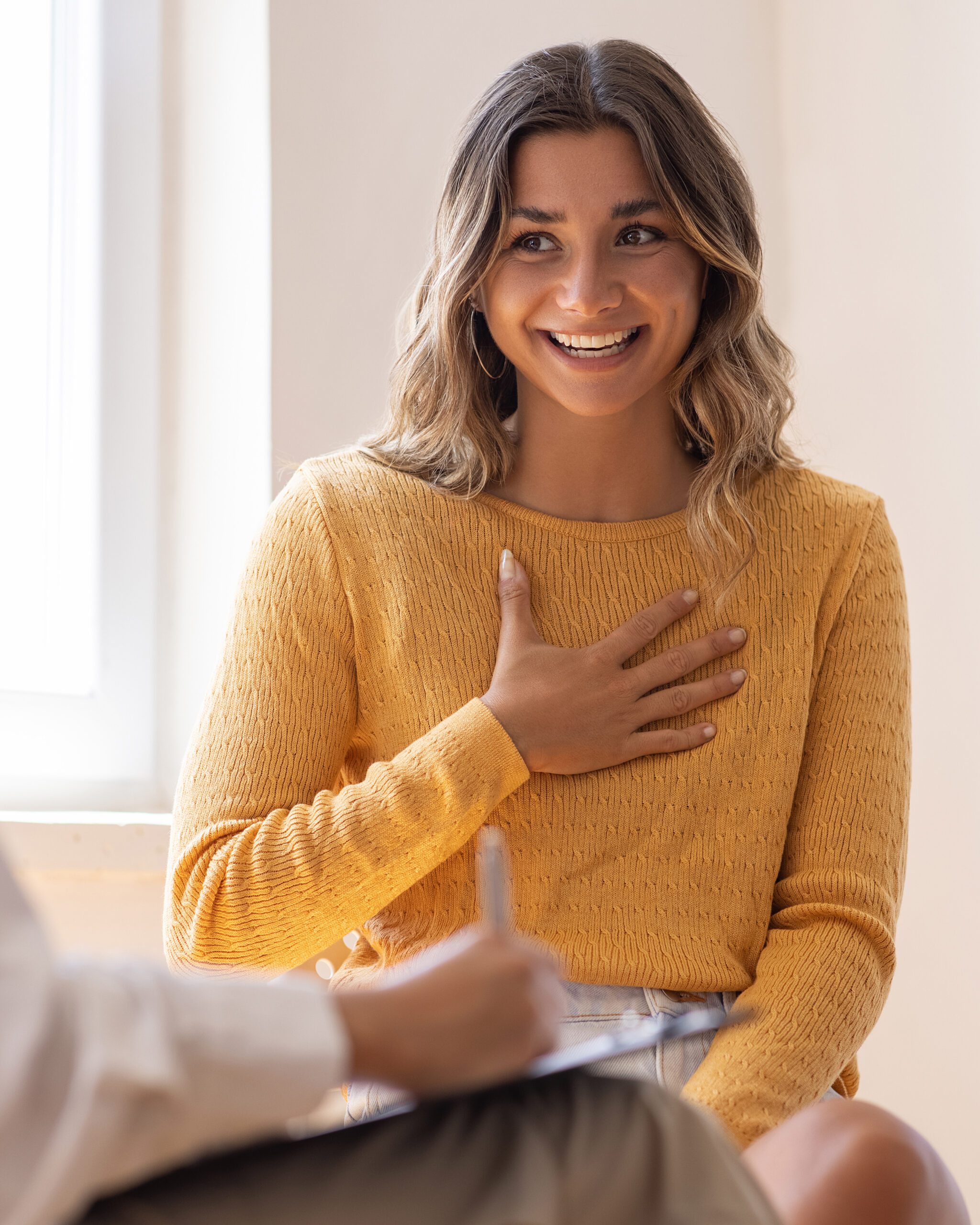 woman conveying happiness from resolution